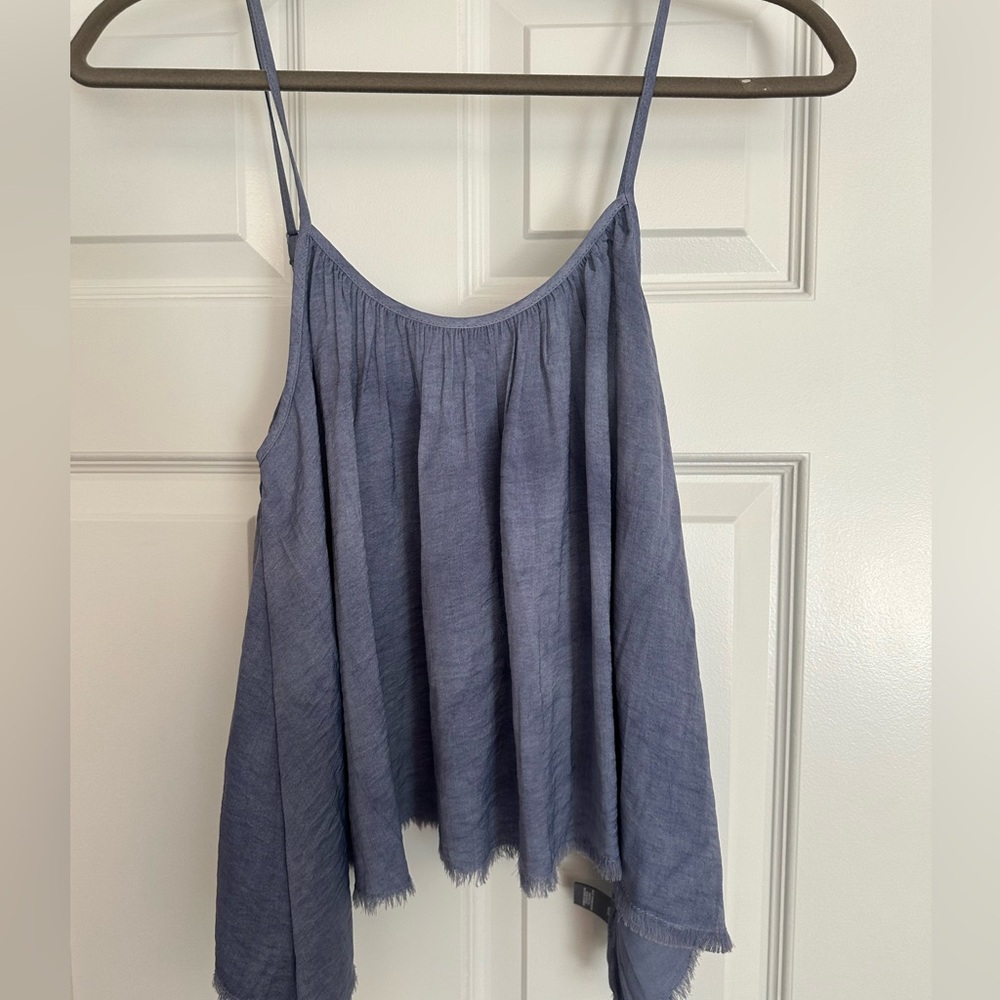 Blue flowy tank top.